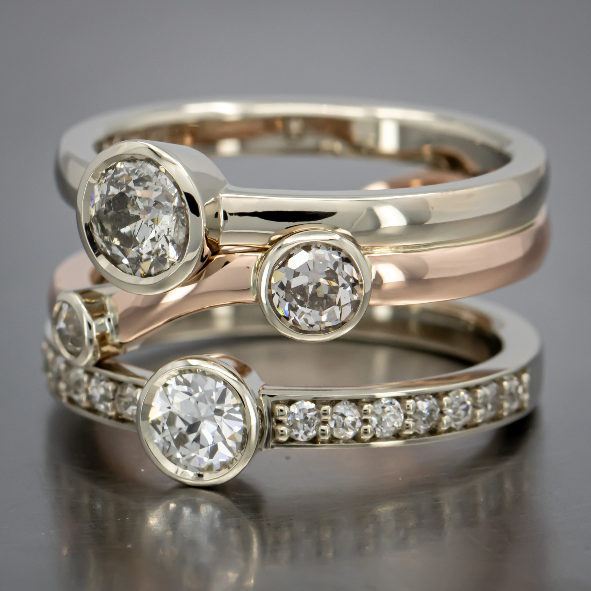 custom-ring-round-diamonds-bezel-set-geometric-three-band-two-toned-bead-set-diamonds-14K-white-rose-gold-RT238761.jpg