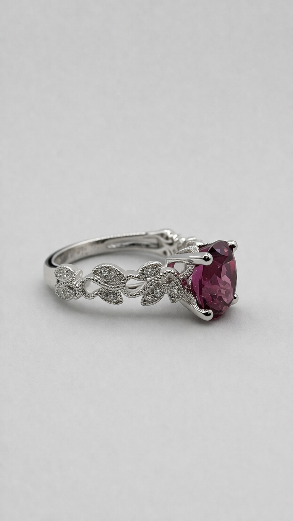 Elegant vine-inspired diamond ring.png