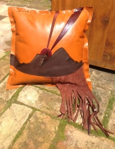 14" x 14" dual-sided leather pillow with fringe