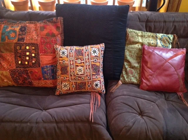 grouping of bask leather pillows