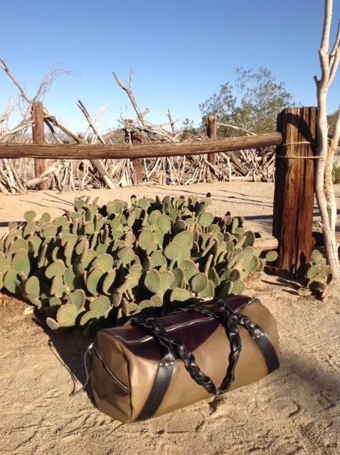 braided leather carry on (sold)