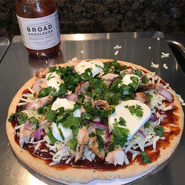 Leftover smoked chicken? No problem, make your own BBQ chicken pizza with Broad Shoulders as your base sauce. Toss on some cilantro, onions, peppers, and mozzarella and you're good to go!