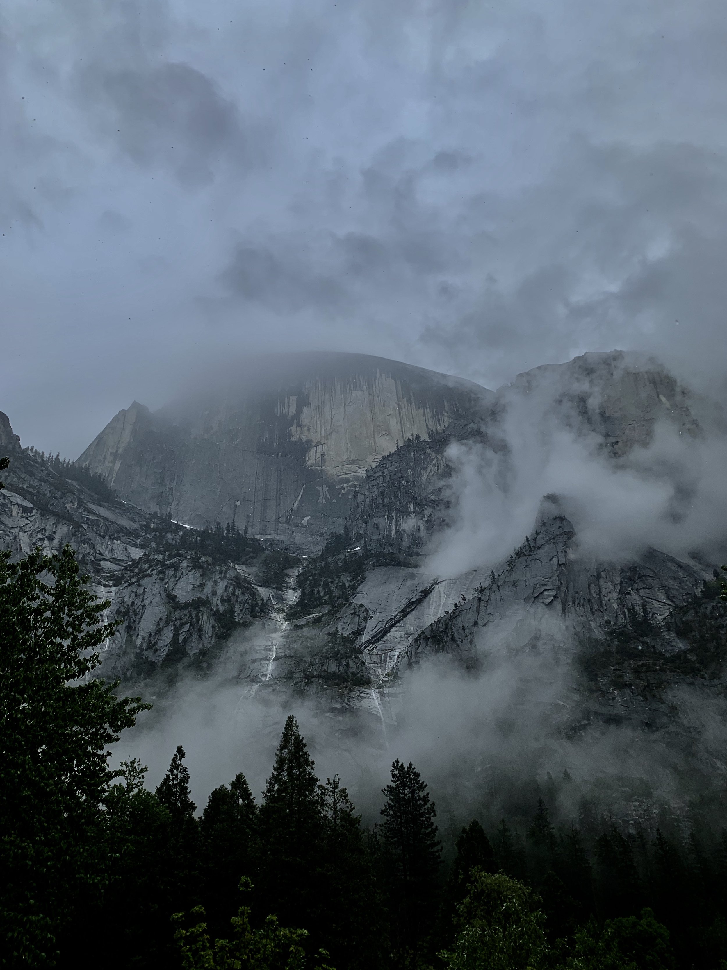 Half Dome in the clouds.