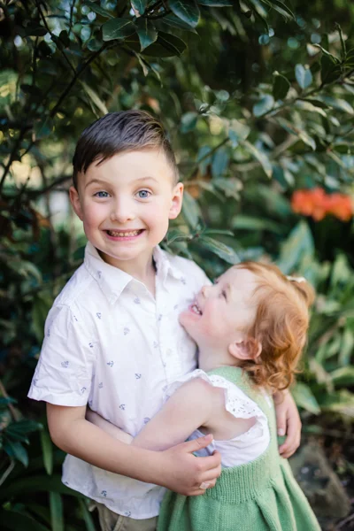 Ballarat family photographer brother sister backlight natural sunset melbourne candid summer red head little girl 