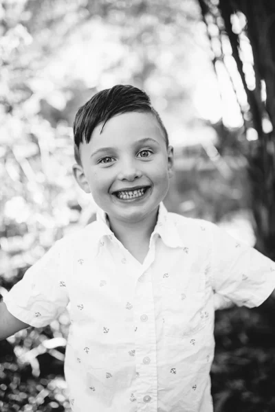 Northcote family photographer brother boy backlight natural sunset melbourne candid summer black and white
