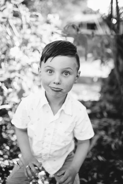 Williamstown family photographer brother boy backlight natural sunset melbourne candid summer black and white