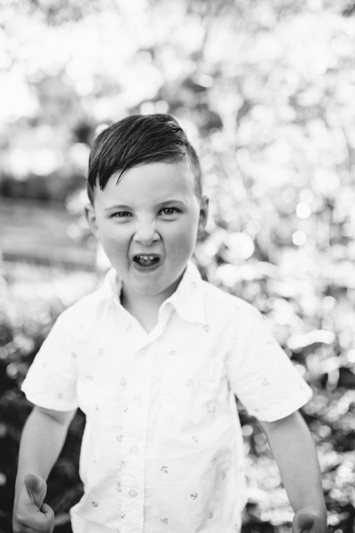 Balwyn north family photographer brother boy backlight natural sunset melbourne candid summer black and white