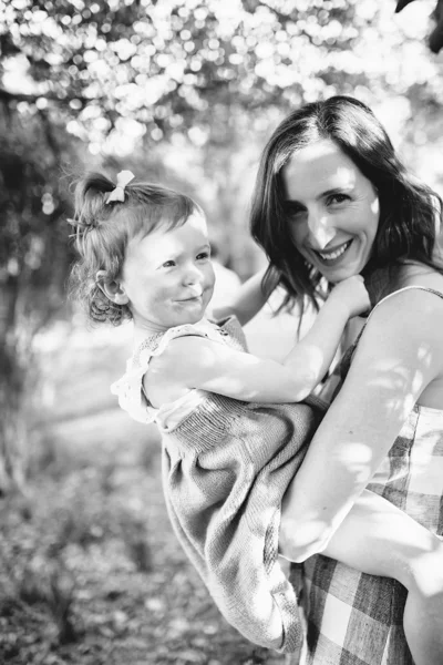 Canterbury family photographer mother and daughter backlight natural sunset melbourne candid summer black and white