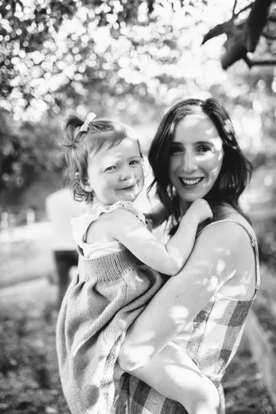 Canterbury family photographer mother and daughter backlight natural sunset melbourne candid summer black and white