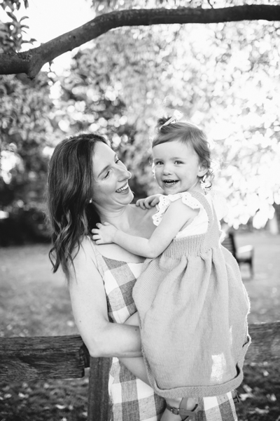 North Melbourne family photographer mother and daughter backlight natural sunset melbourne candid summer black and white
