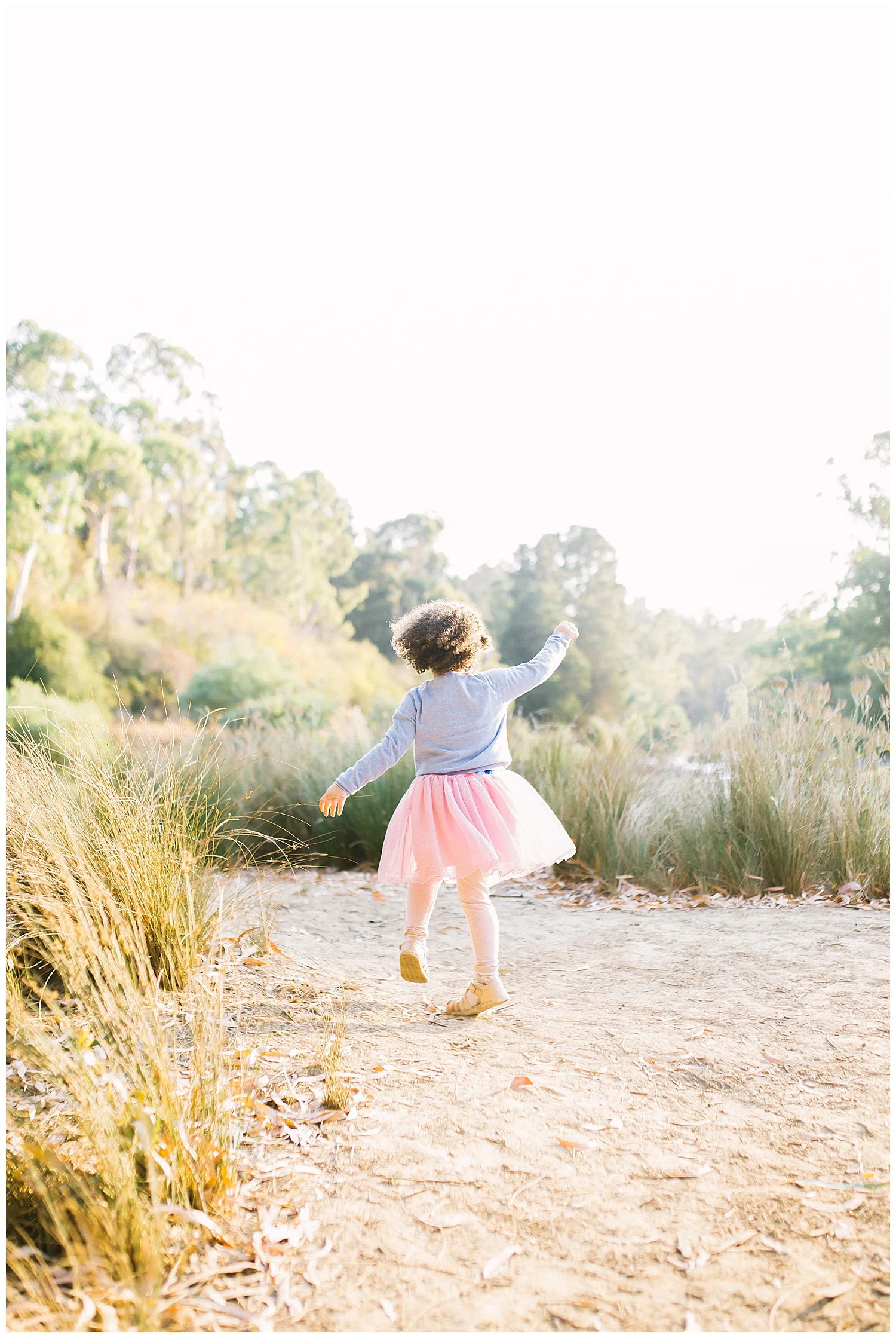 Mother and daughter family and newborn photographer photography portrait beach sunrise sunset black and white candid natural light sunlight 