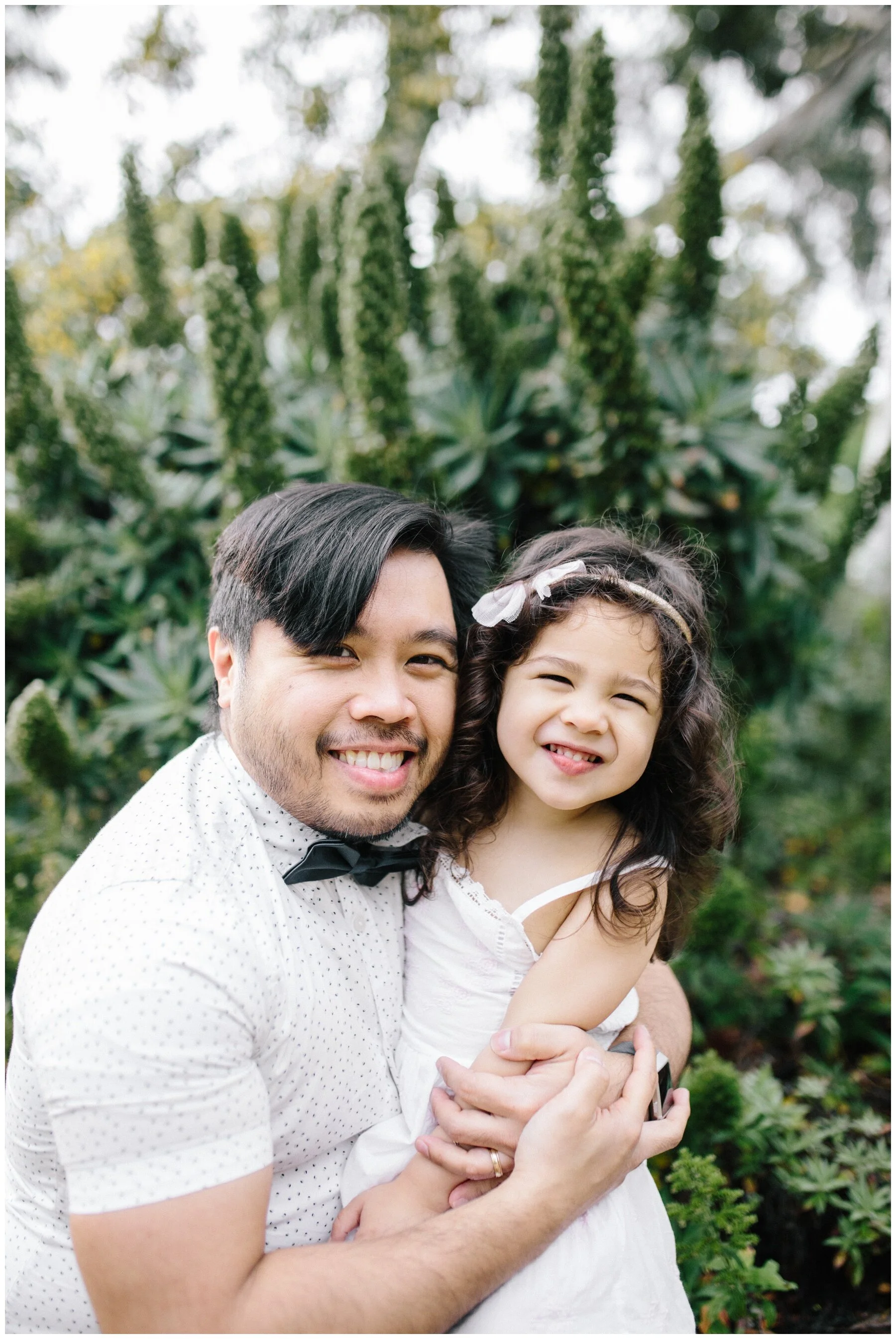 Kew family photographer photography father and baby daughter rose garden