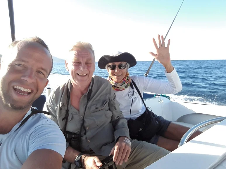 Bob (centre) along with The Bajan Birder and Jade are all smiles as we set off across the ocean bound for Montserrat