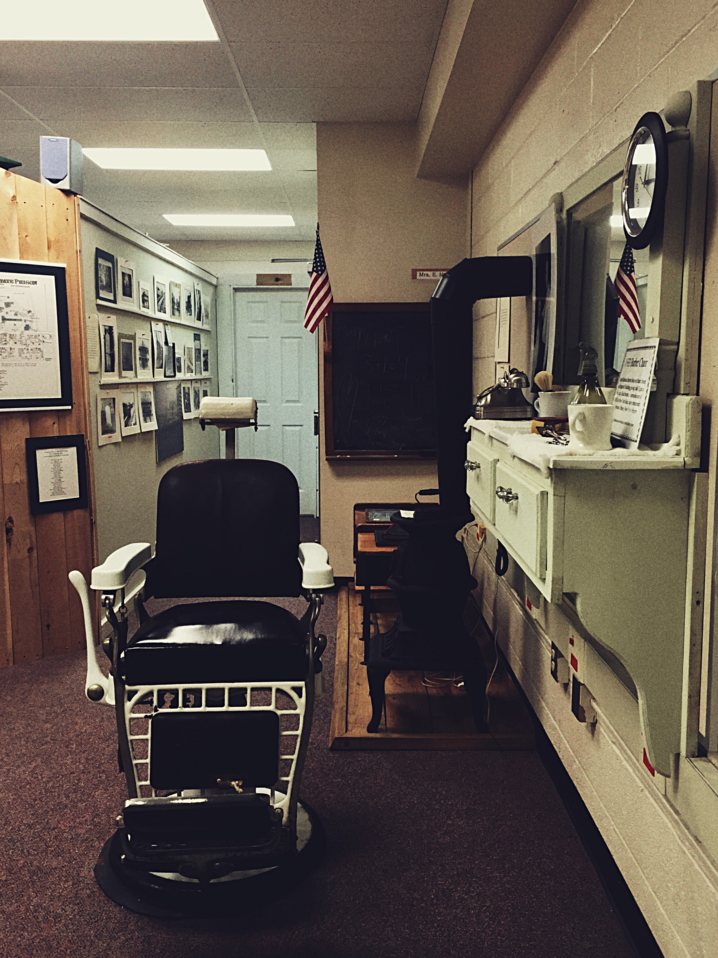  An old barber's chair from Clinton Correctional Facility on display in the Museum at the Dannemora Free Library.  (Chelsia Rose Marcius/Aug. 14, 2016)  