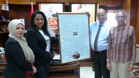 Delivering messages from Australia to the Mayor of Nablus (second from right).