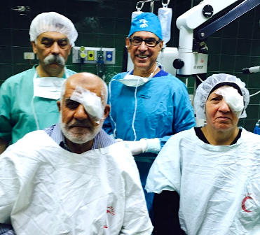 A highlight was operating on a husband and wife, one after the other on the same day, pictured here with Dr Anan Matar, the resident surgeon (left), and Dr Francis Nathan (right).