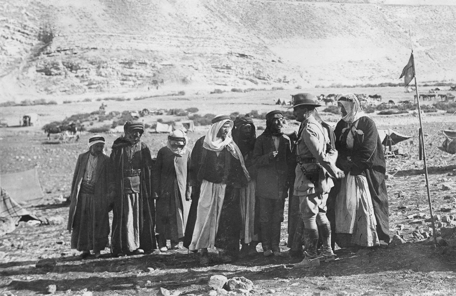 Australian solider talking with a group of Arabs in Palestine, 1918. [Photo with permission from State Library of South Australia, PRG280/1/15/1072.]