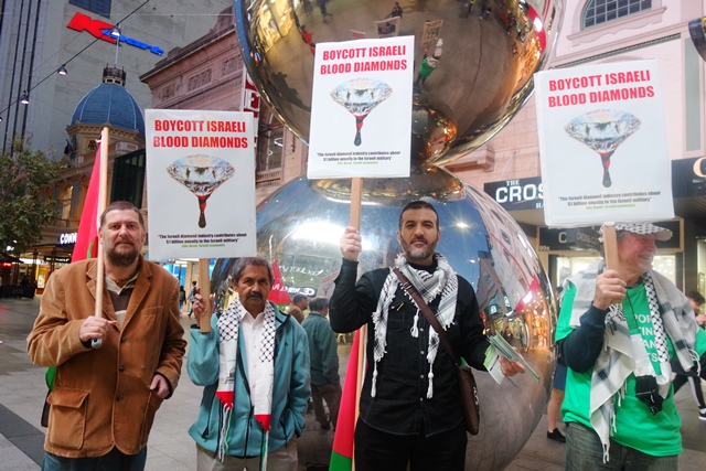 The AFOPA activists with their new placards in Rundle Mall, Adelaide, highlighting the Israeli diamond industry and its complicity with human rights abuses. Australia is chair of the 2017 Kimberley Process meetings this year.