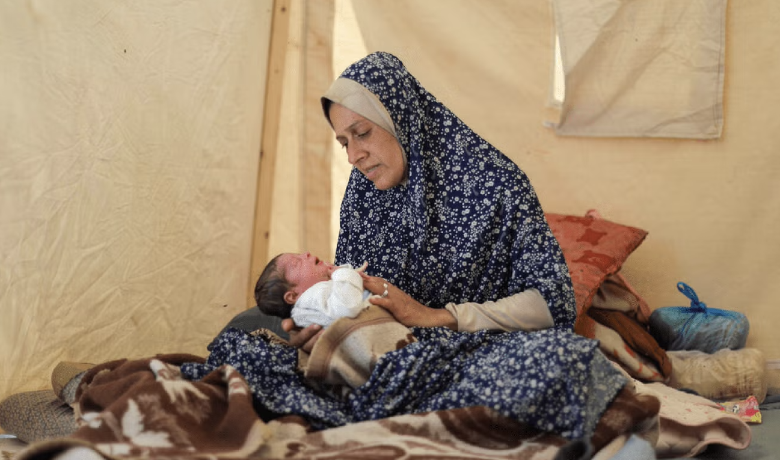 Jawaher, a displaced mother from northern Gaza who gave birth while fleeing violence (source: UNFPA Palestine)