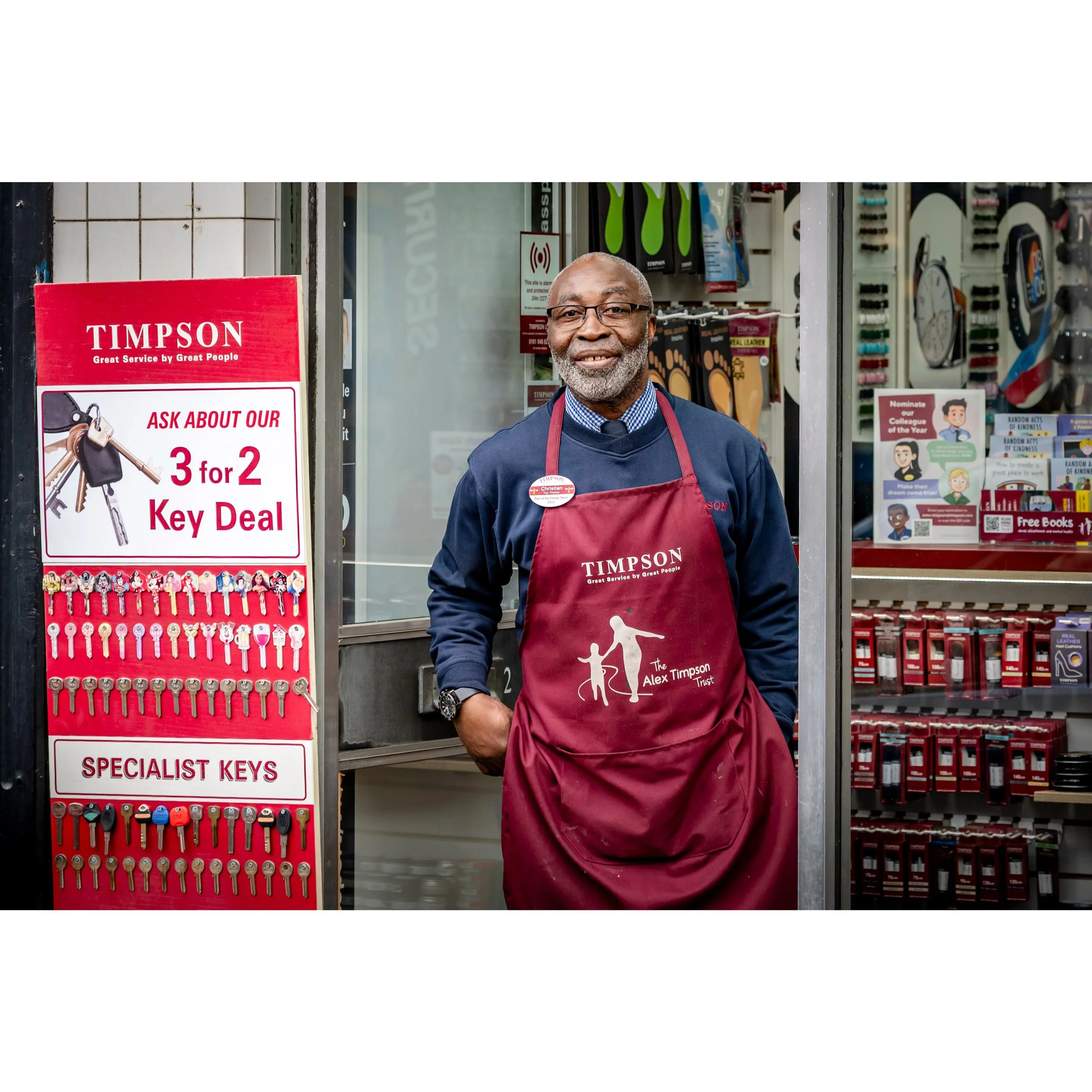 While running up the street covering the With Banners Held High event in Wakefield, I quickly snapped Christian watching from the door of his @timpsonuk shop. Universally acknowledged to be an absolute gentleman and warm human being, he also provides