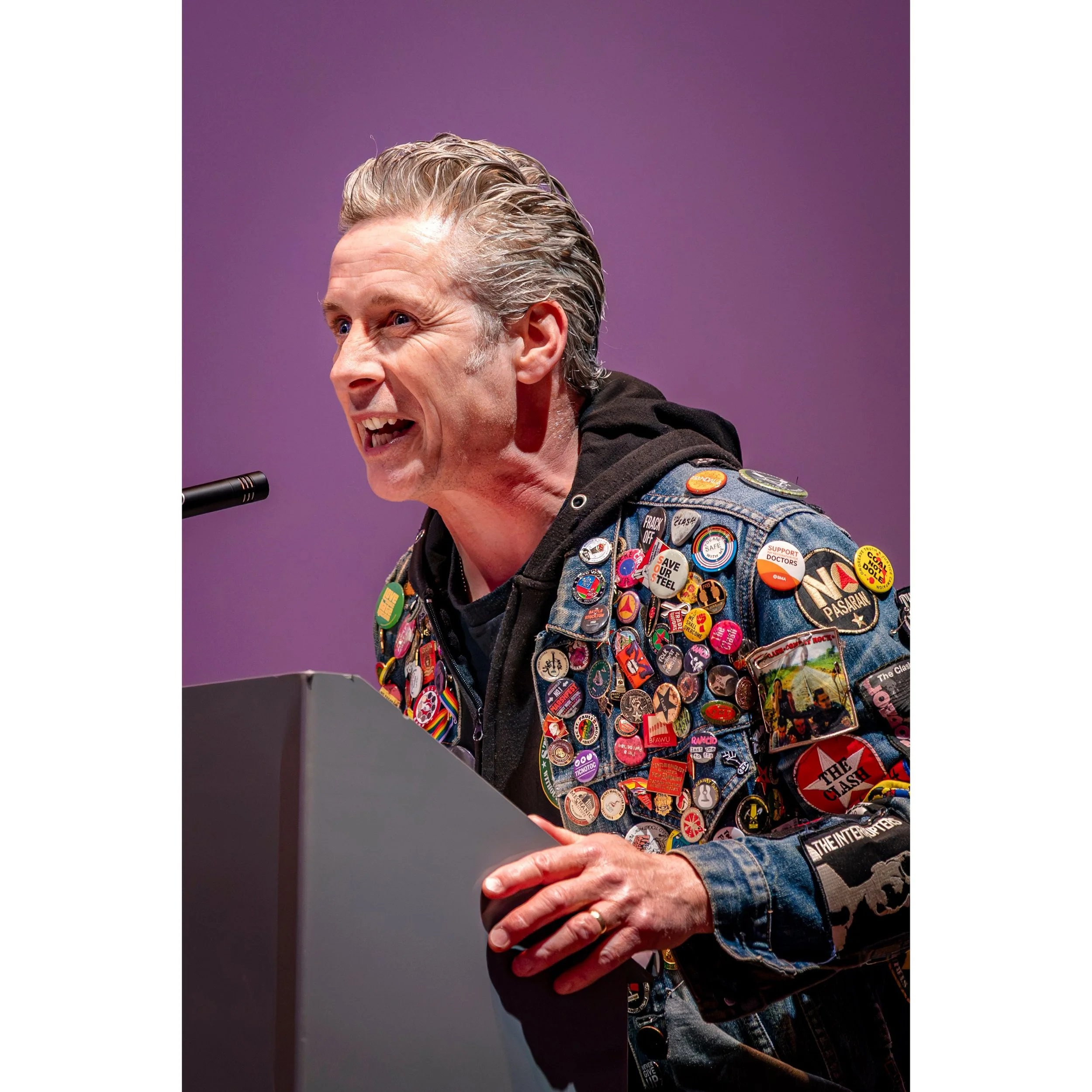 Joe Solo, musician, poet, writer and activist at the opening of Last weekend&rsquo;s With Banners Held High in Wakefield, reciting his poem marking the centenary of the General Strike and the 90th anniversary of the Battle of Cable Street, where in O