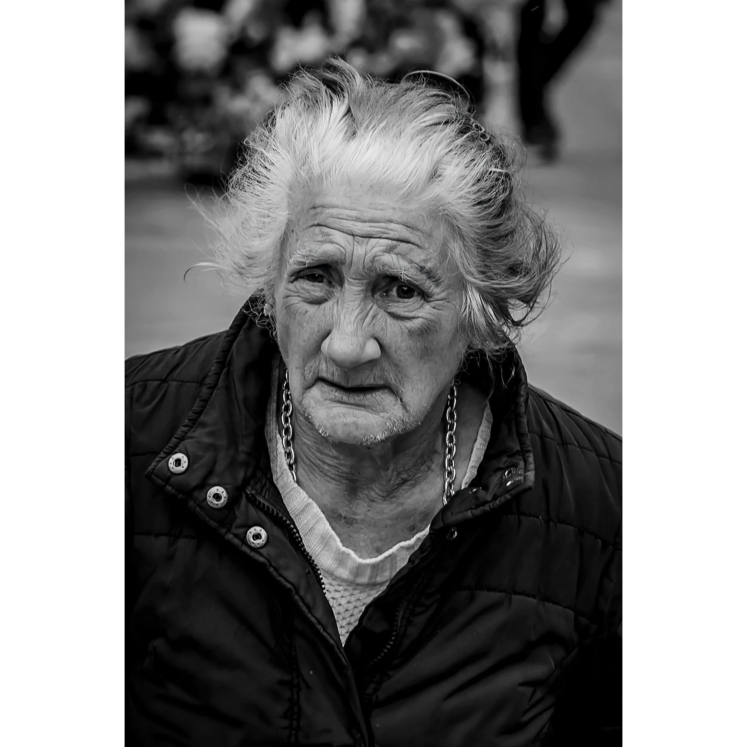 Caught this lady in Leeds completely by accident as she wandered into my field of view, noticed the very hefty silver chain she was wearing.

#leeds #bnwstreetphotography #streetportrait #blackandwhitephotography #bnwstreetportraits