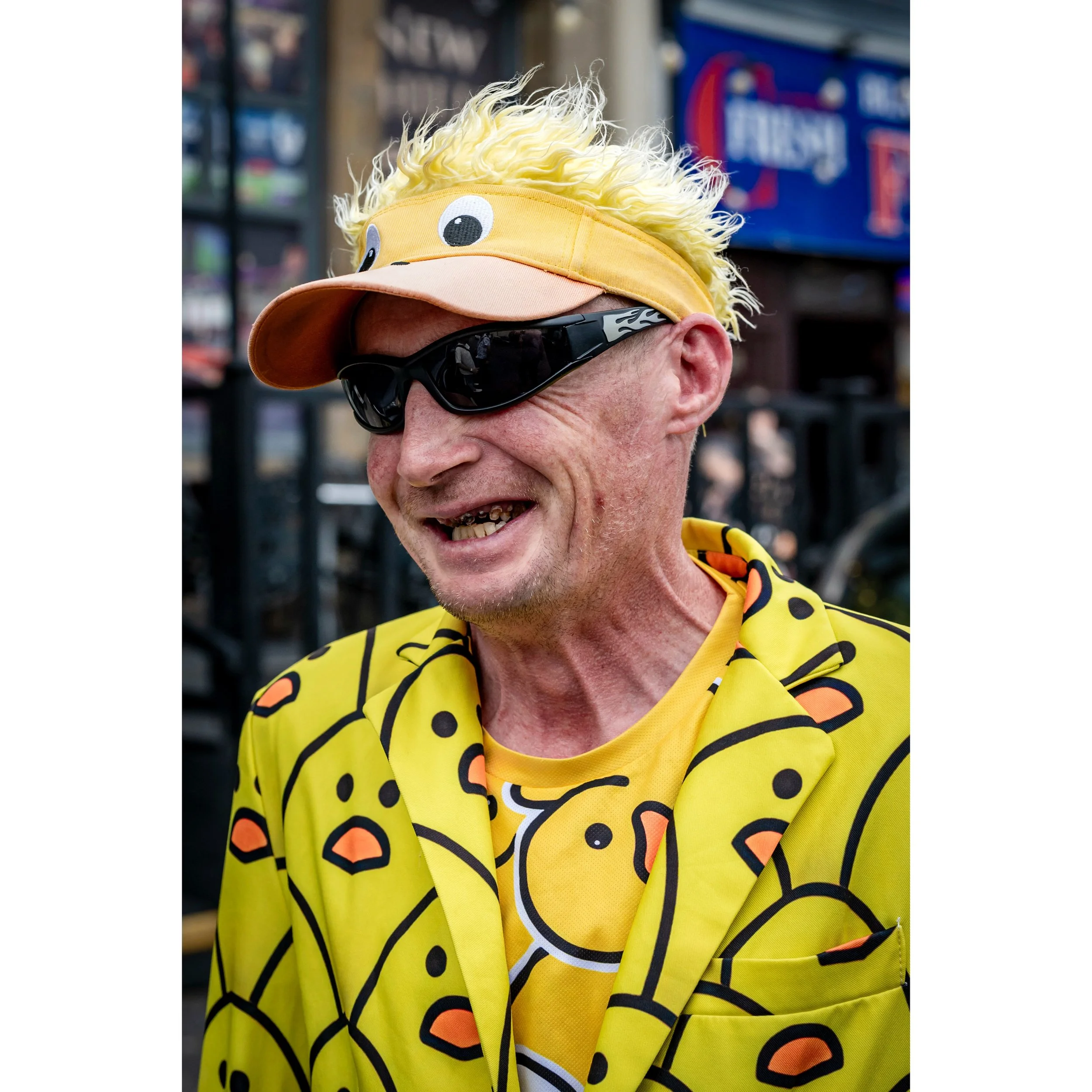 If it looks like a duck, walks like a duck and quacks like a duck, then it just may be a duck.
The Duck Man of Blackpool. His duck suits are available from Temu, I&rsquo;ve looked and they have them in my size. 🐥

#blackpool #streetportrait #streetp