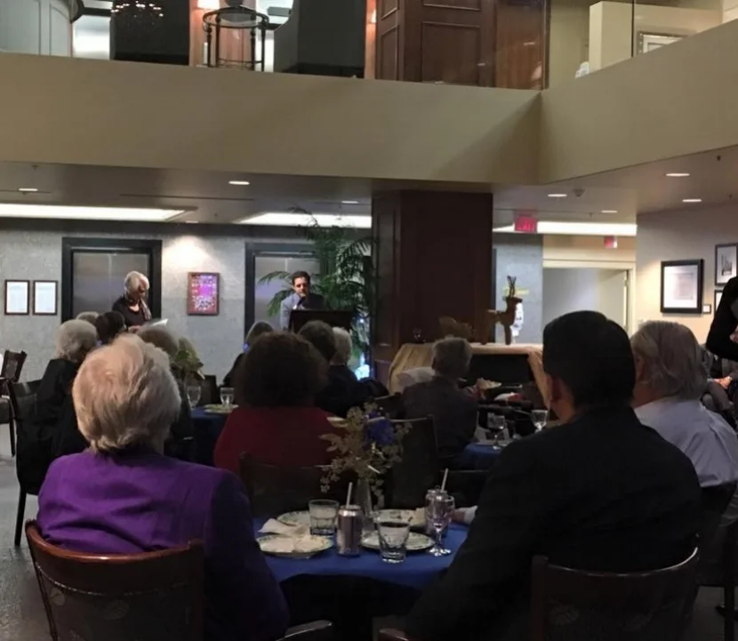 Michael Braund (managing editor) introducing the author.