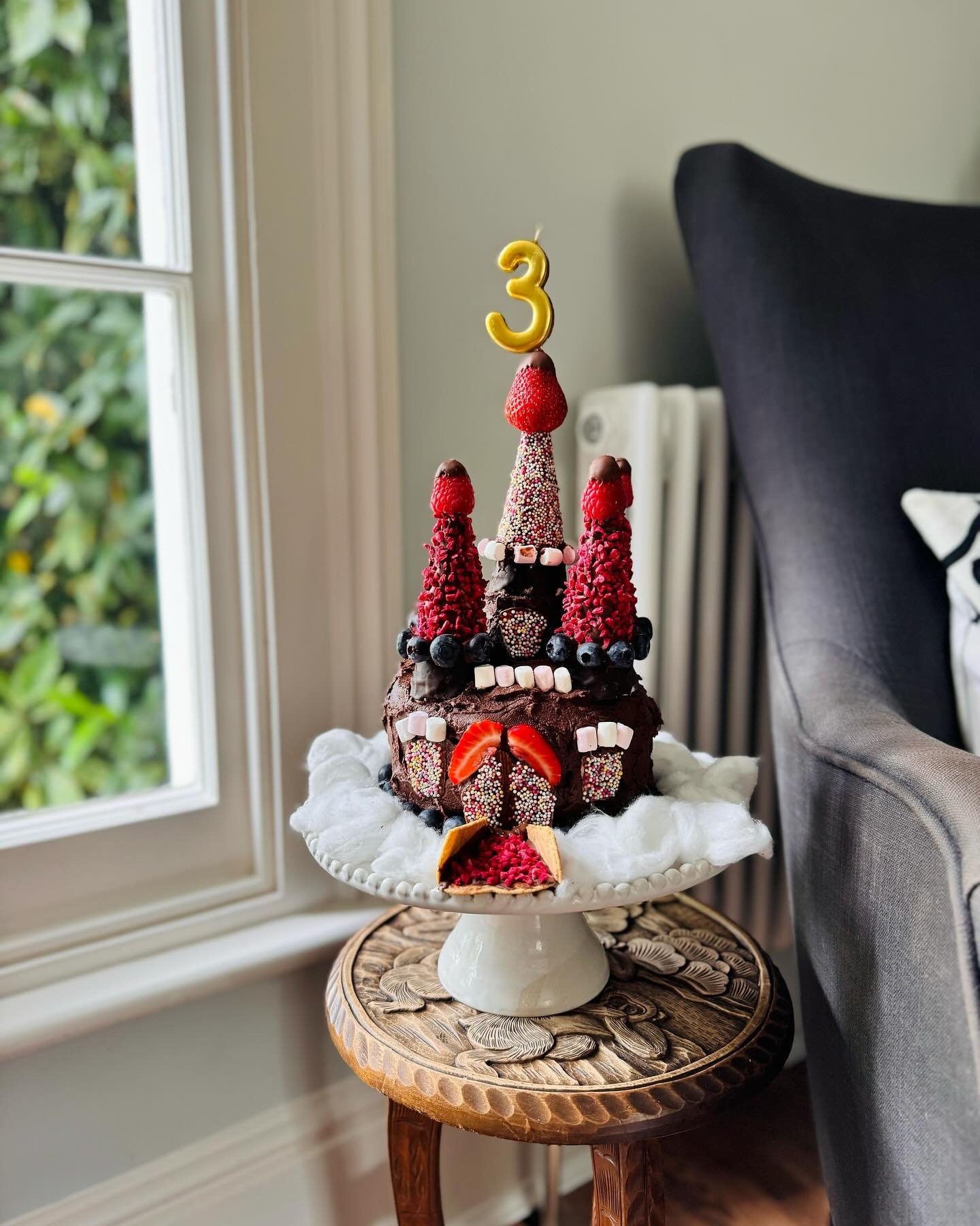 Happy third birthday to my sweet boy. At his request: a pink chocolate castle cake with a drawbridge. Not at his request: questionable structural integrity. &hearts;️ 🏰