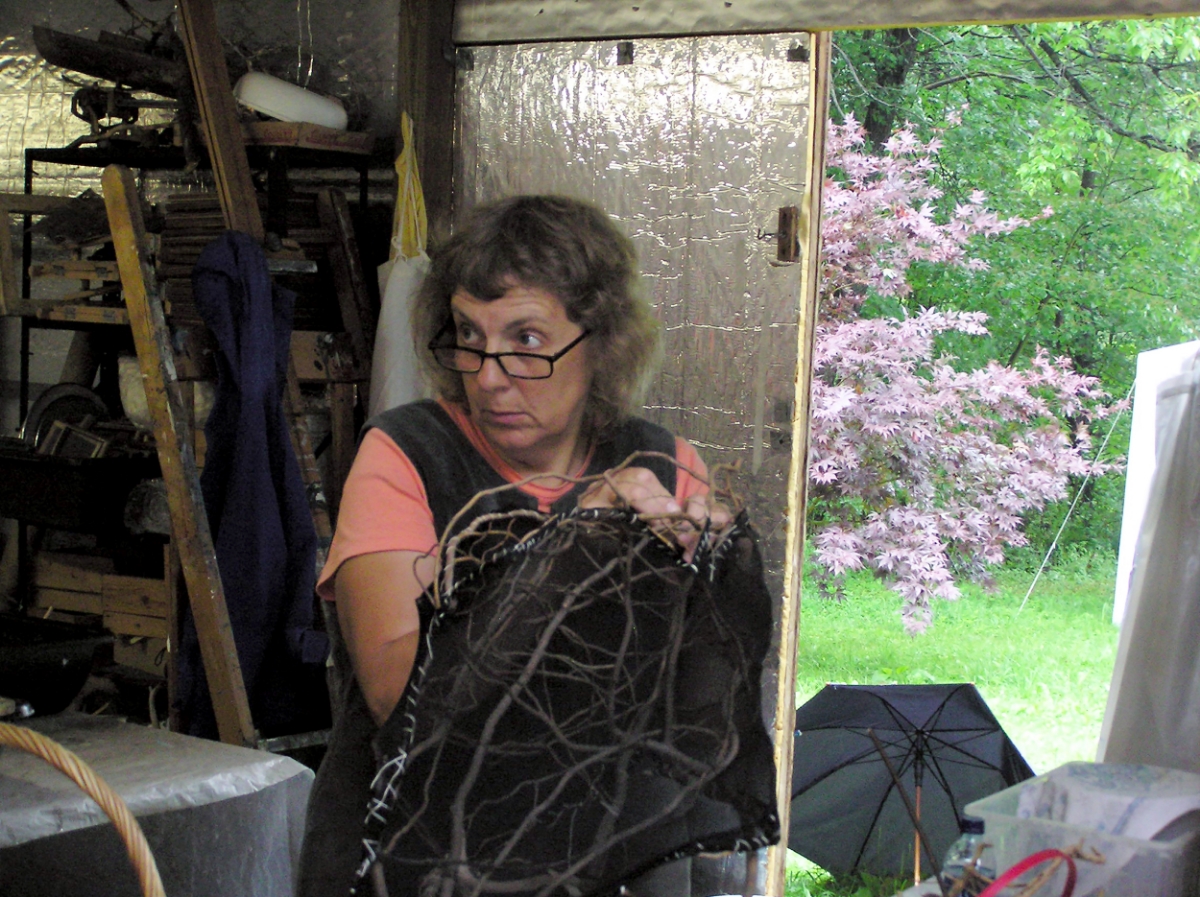  Bonnie applying cloth to her willow armature. 