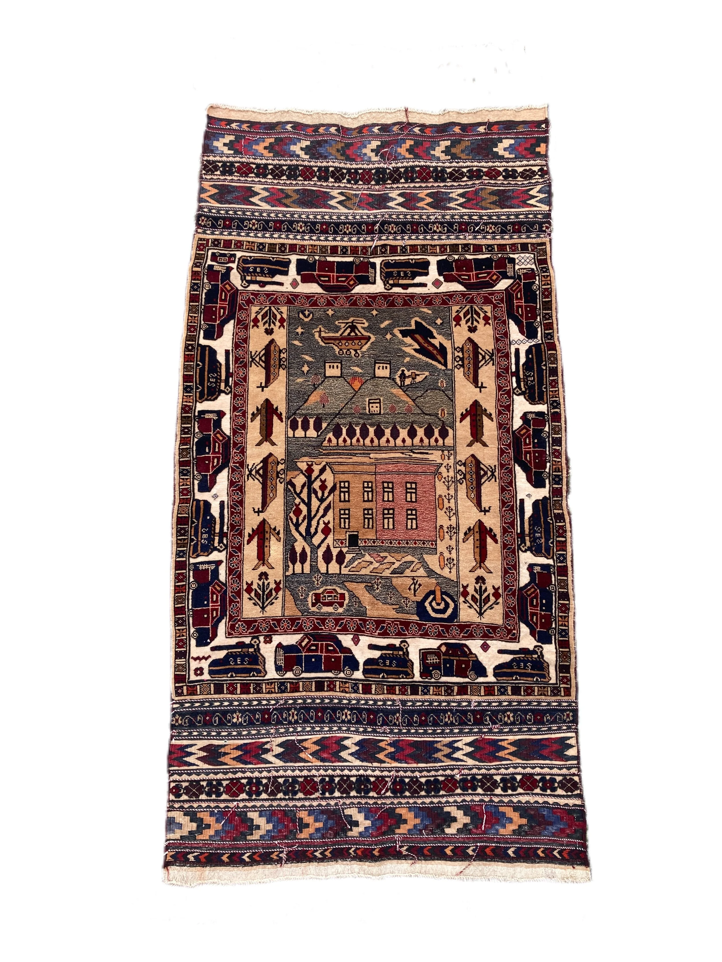21.28.00001_2 Vintage Afghan Belouch War Rug.JPG