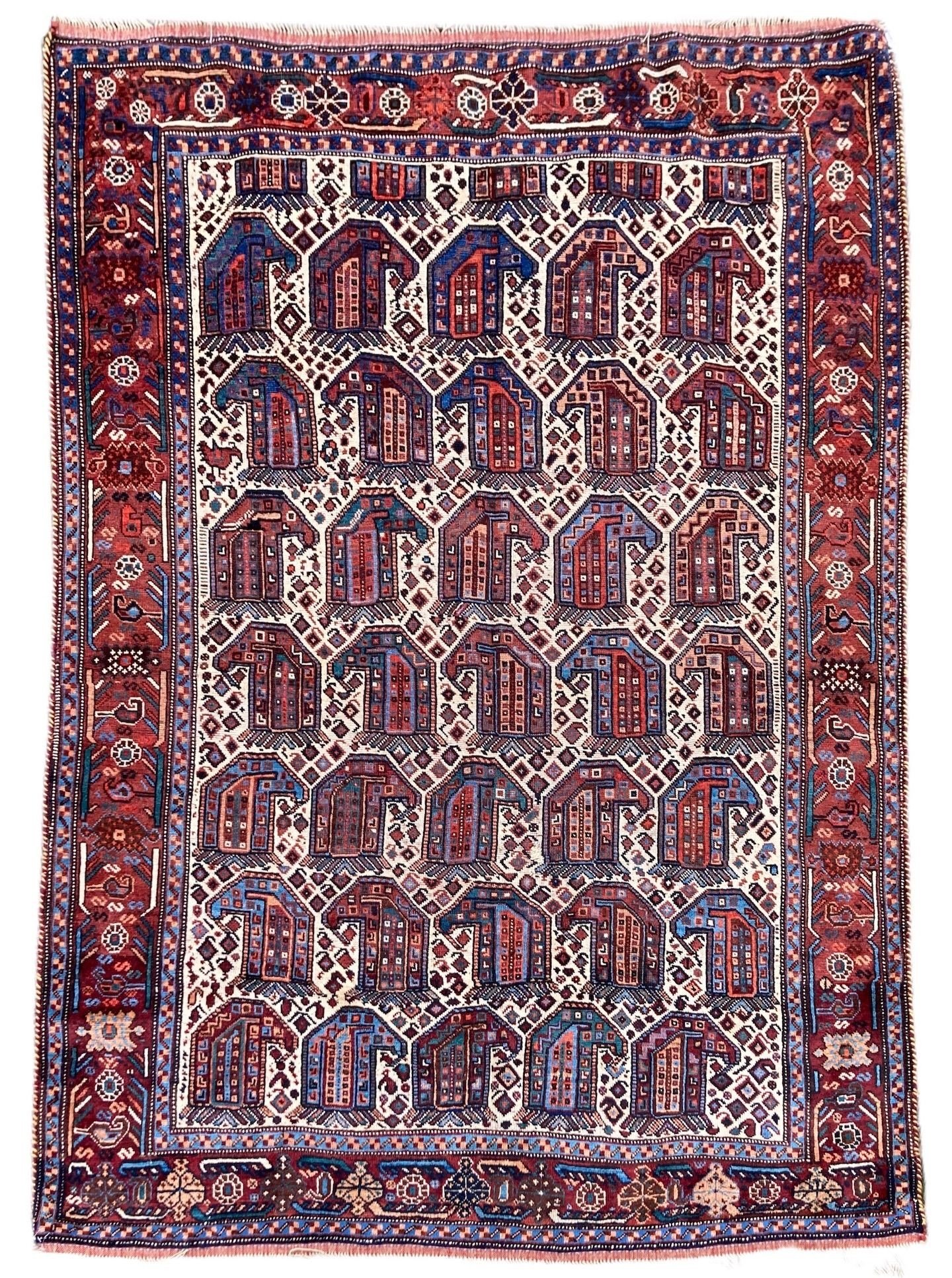 0_220200005_antique_persian_tribal_khamseh_rug.jpeg