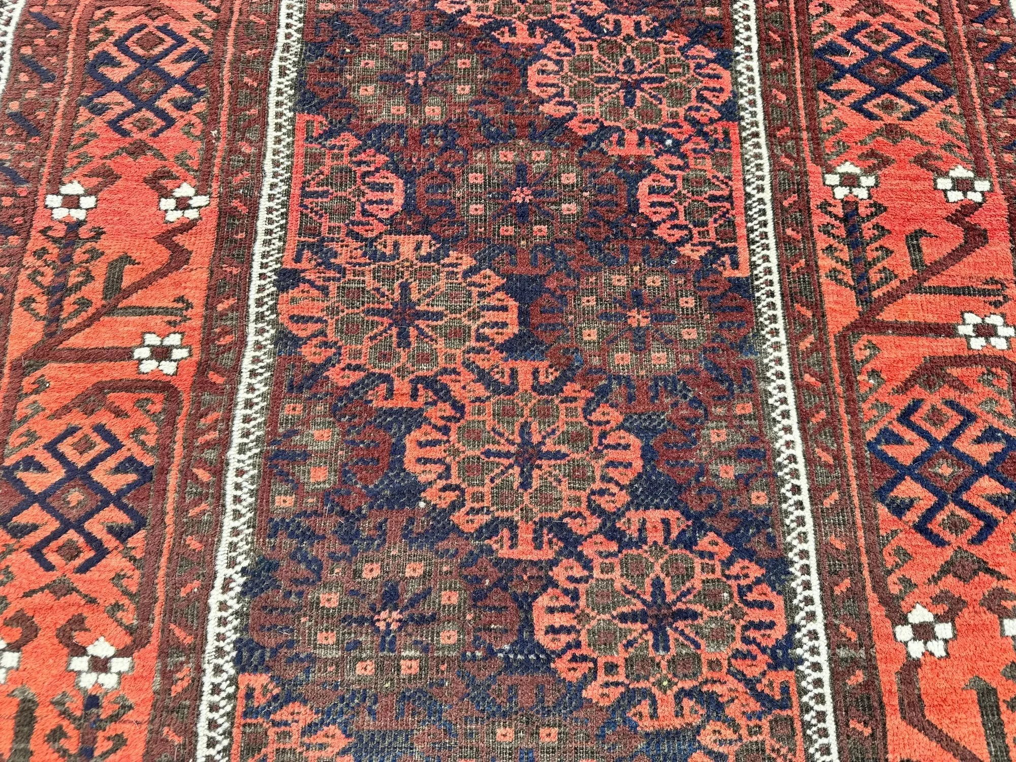 7_251000001_7_Antique_Persian_Belouch_Rug.jpeg