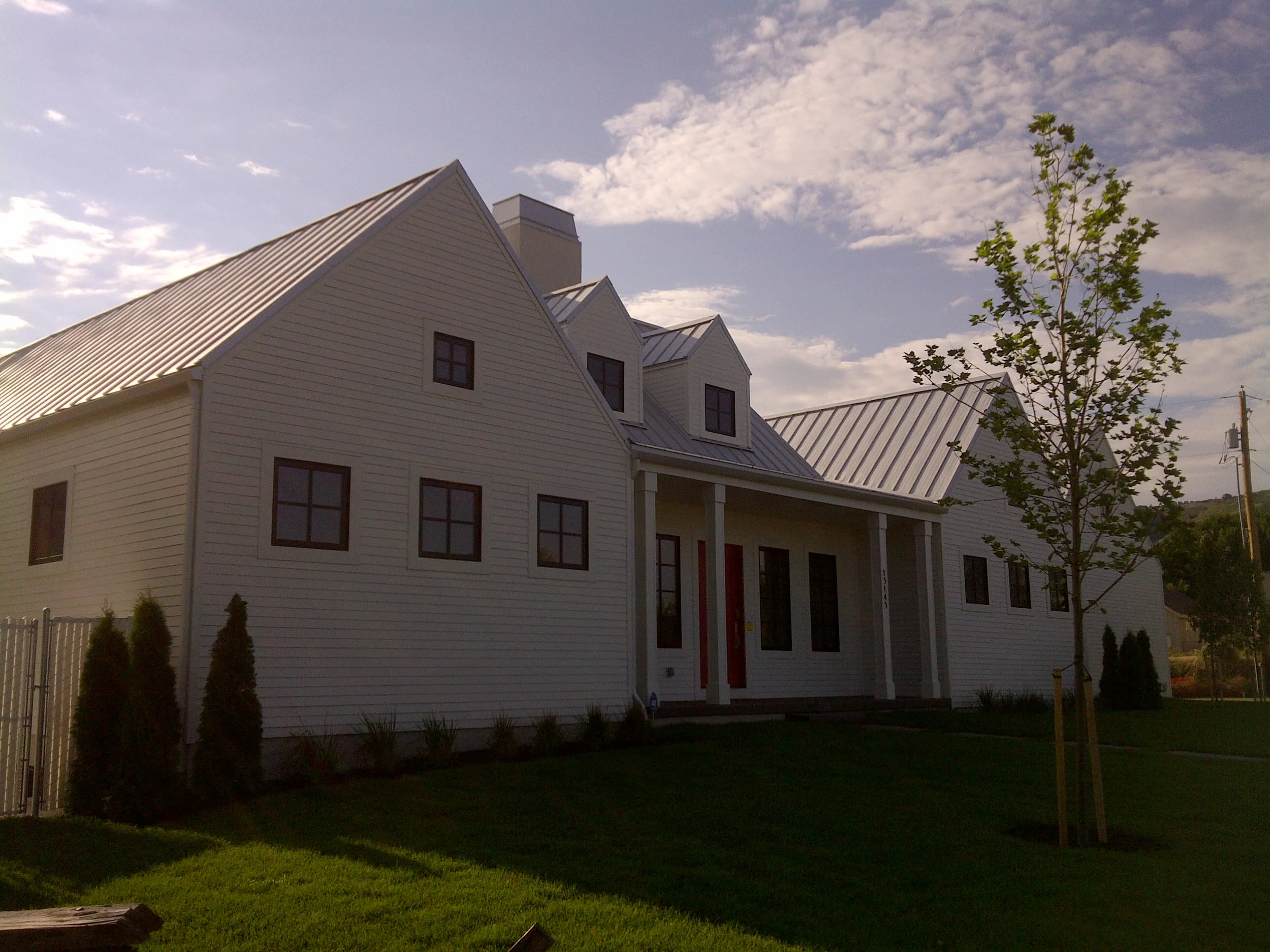 Fiber cement siding, white farm house