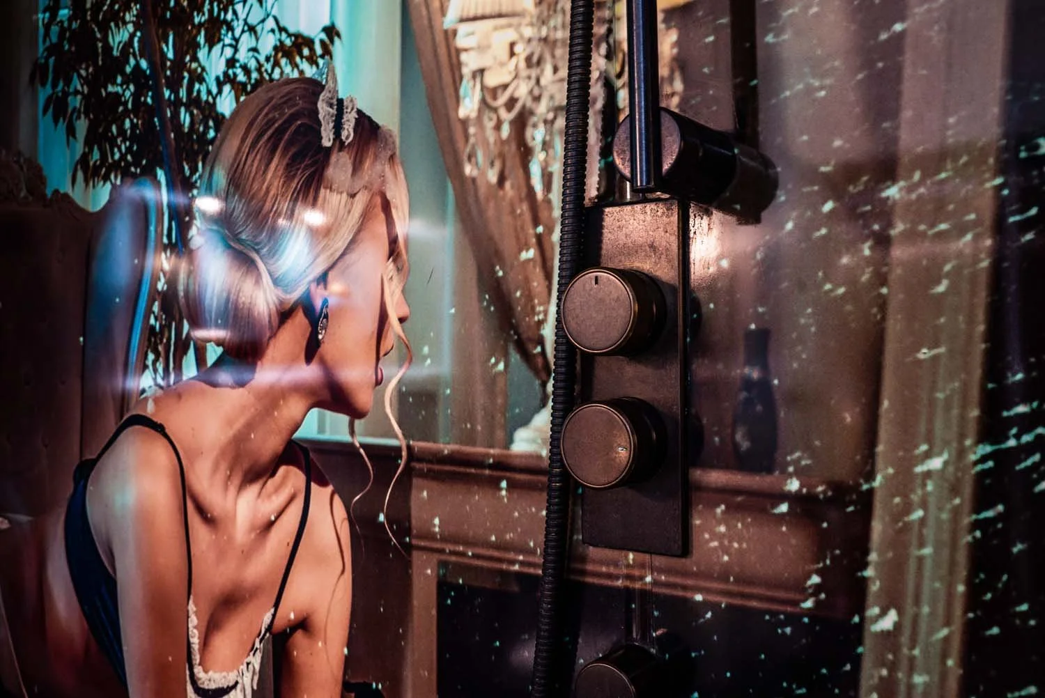 Blonde French Maid model image detail, featured on the walls of a shower, detail of shower control mounted on the wall image