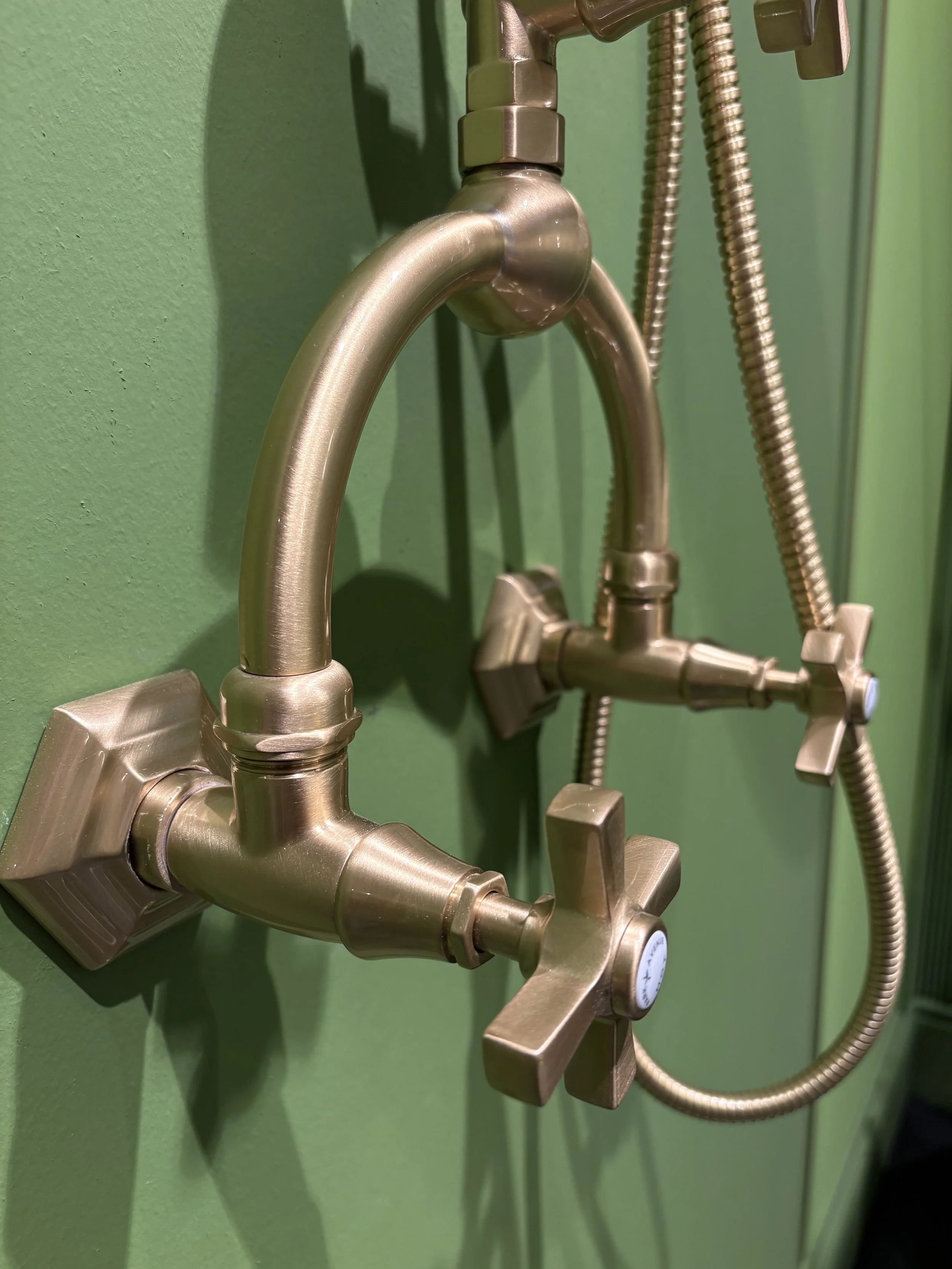 Brass Traditional style shower mixer in a modern green show bathroom