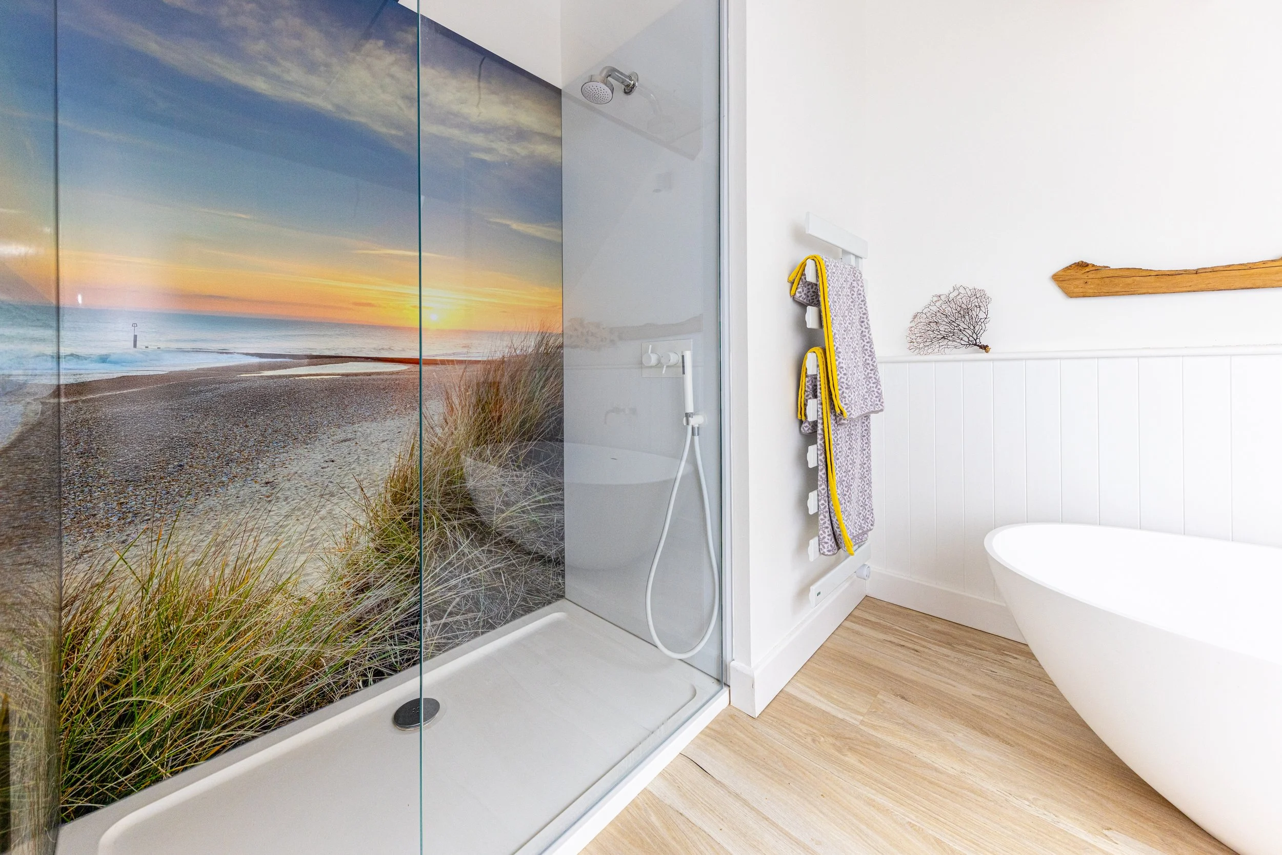 Showerscape image shower wall panels in bathroom shower area showing Coastal Sunset image