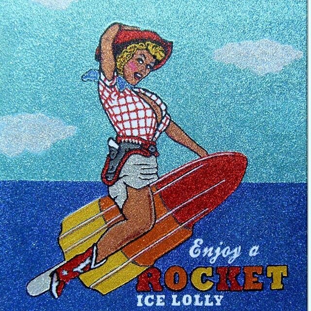 Beyond glitter: Sue Zola&rsquo;s compositions take us beyond child&rsquo;s play into the world of kitschy pop. &ldquo;Rocket Girl&rdquo; pushes the boundaries of innocence, with its 50&rsquo;s pinup girl riding a 70&rsquo;s rocket popsicle like a US 