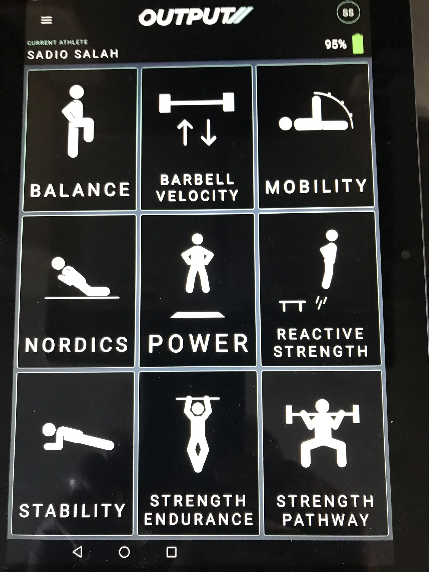 The testing menu board at SPARC listing balance, barbell velocity, mobility, nordics, power and reactive strength.