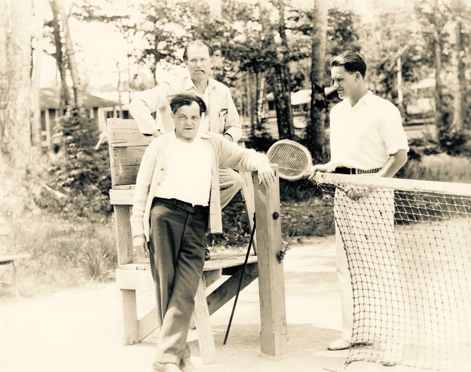 Warren Hymer (standing right) with his father, playwright John B. Hymer (seated) and playwright Sam Shipman (standing left) at the tennis courts at Lakewood. (Author's collection.)