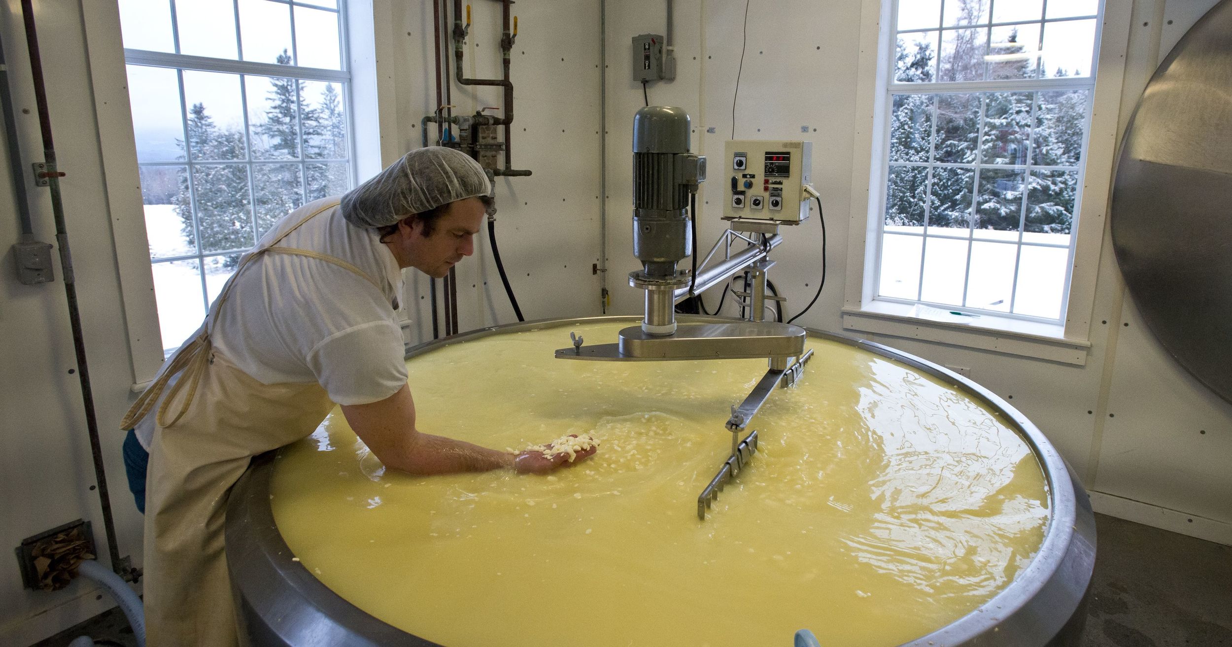 mateo making cheese.jpg