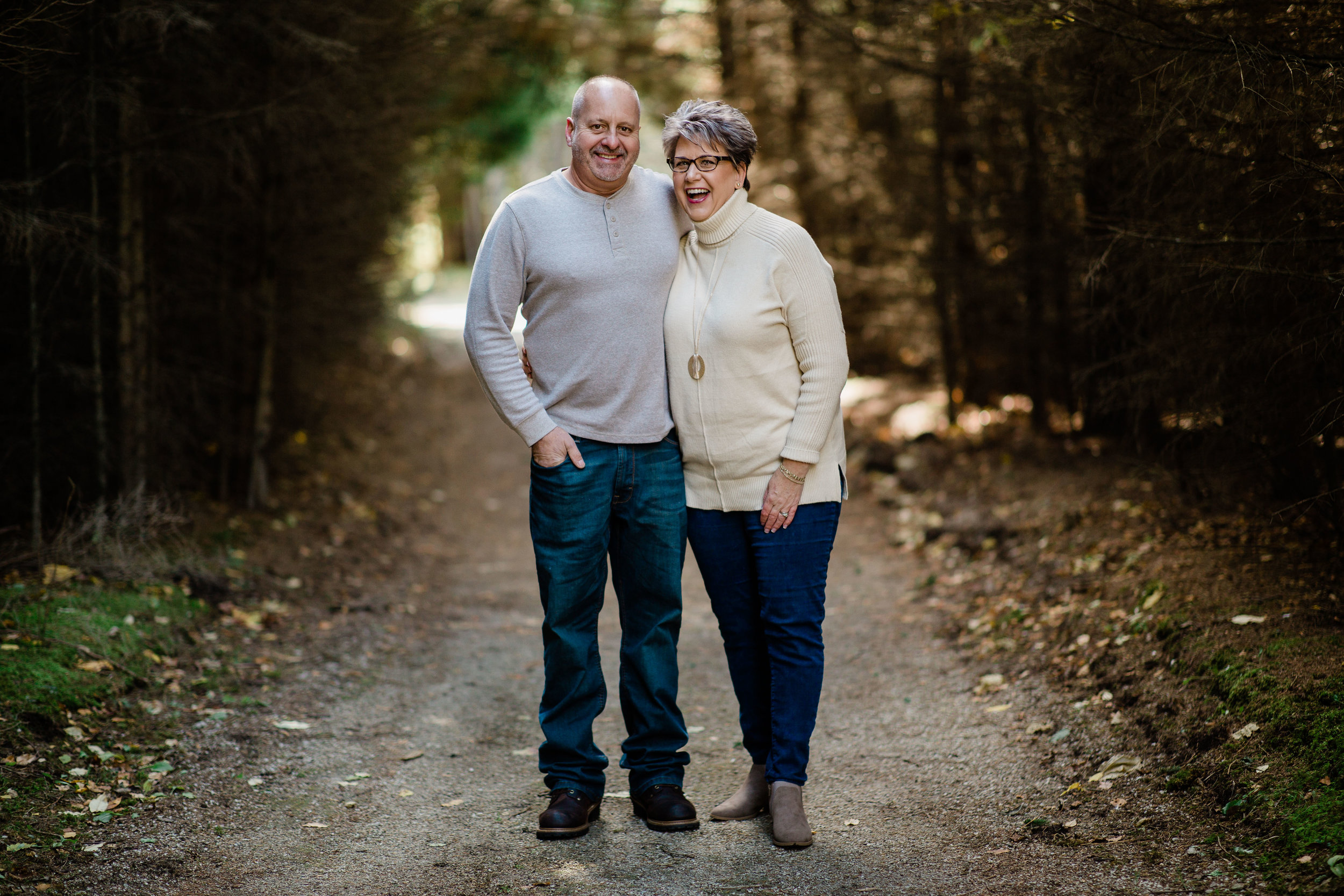 Grandparents family formal. on gravel trail.