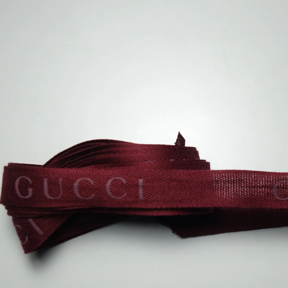 Gucci | Accessory | Gucci Ribbon Strap in Red/Burgundy with Black Logo Gucci Red/Blue Vintage Web Grosgrain Ribbon Tiger Neck Bow  main image 2