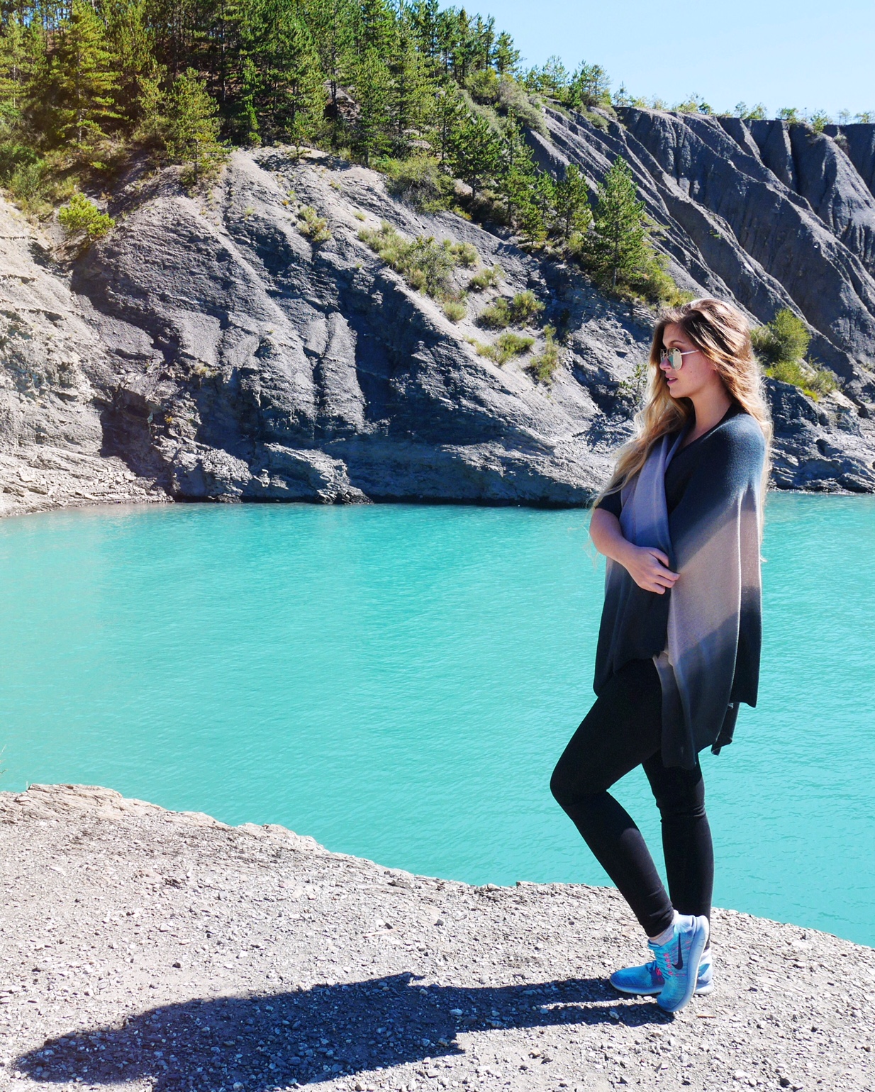 Me posing in front of the blue waters of Lac de Serre-Ponçon - French Alps - France