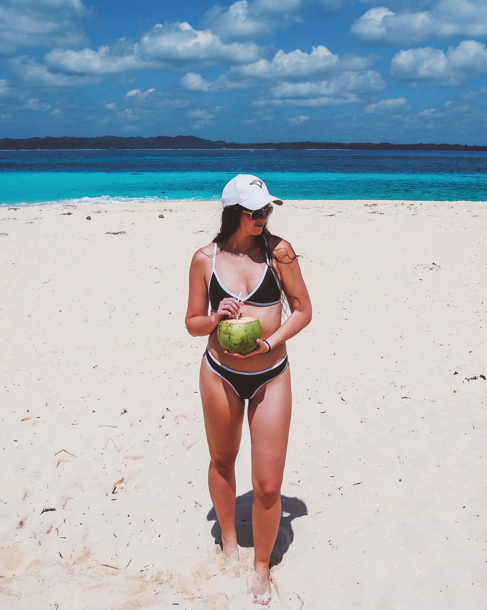 Enjoying my coconut - Daku Island - Siargao - Philippines