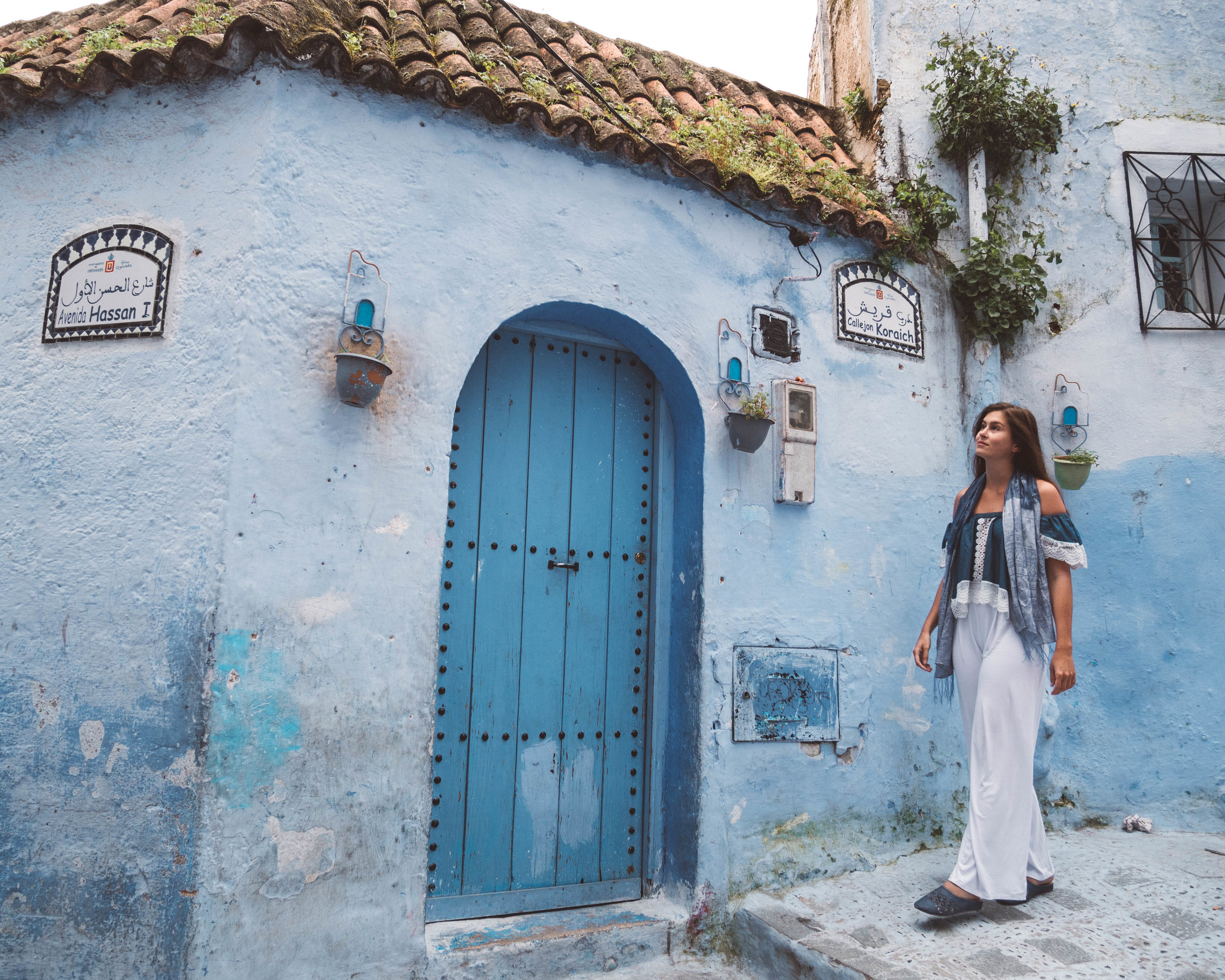 Me walking in front of someone's blue house - Chefchaouen - Morocco
