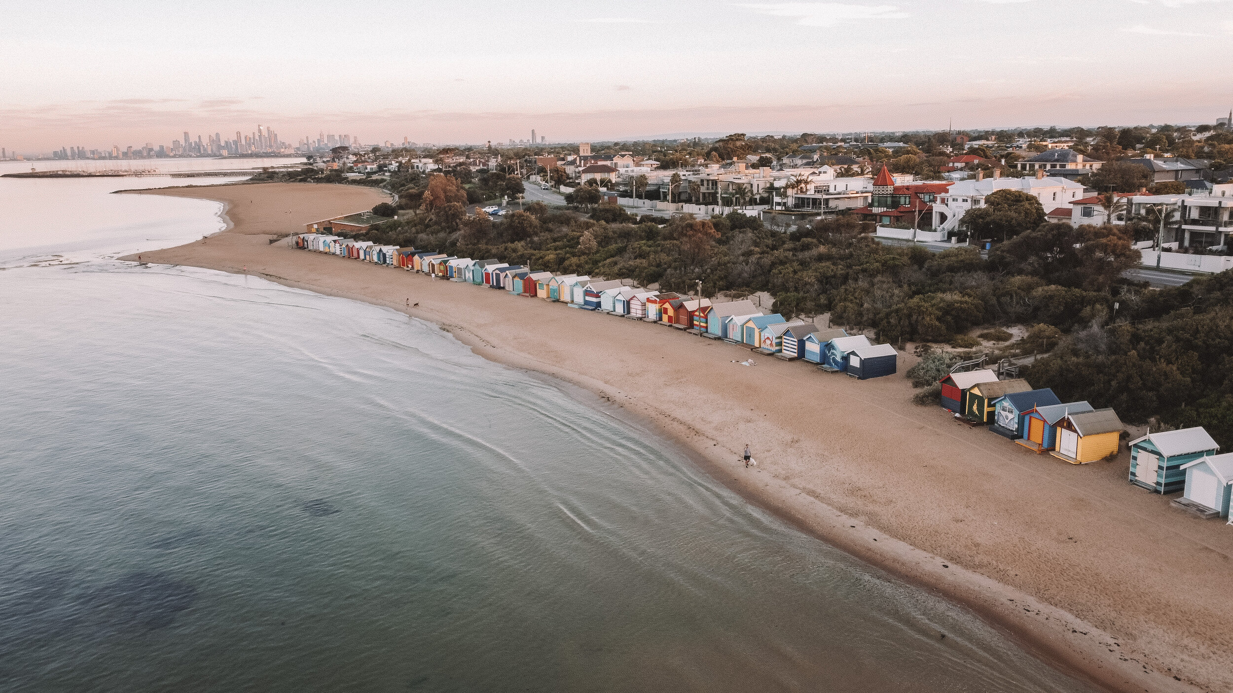 DJI Mavic Mini Drone Shot with the city skyline in the background - Brighton Bathing Boxes - Brighton - Melbourne - Victoria - Australia