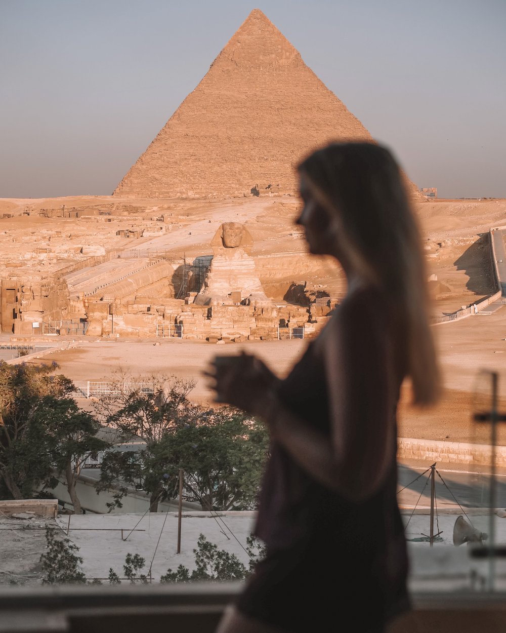 Morning coffee with the Sphinx and the Pyramids of Giza - Cairo - Egypt