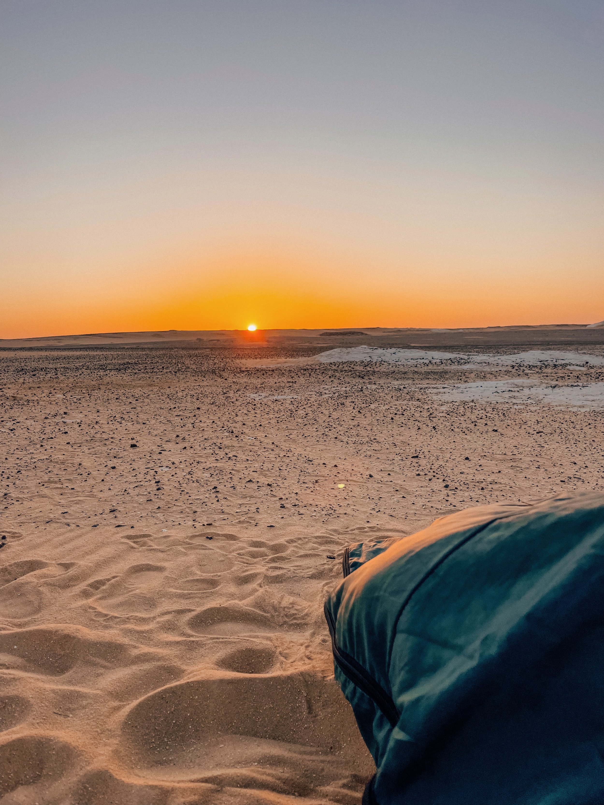 Waking up at sunrise in my sleeping bag - White Desert - Western Desert of Egypt