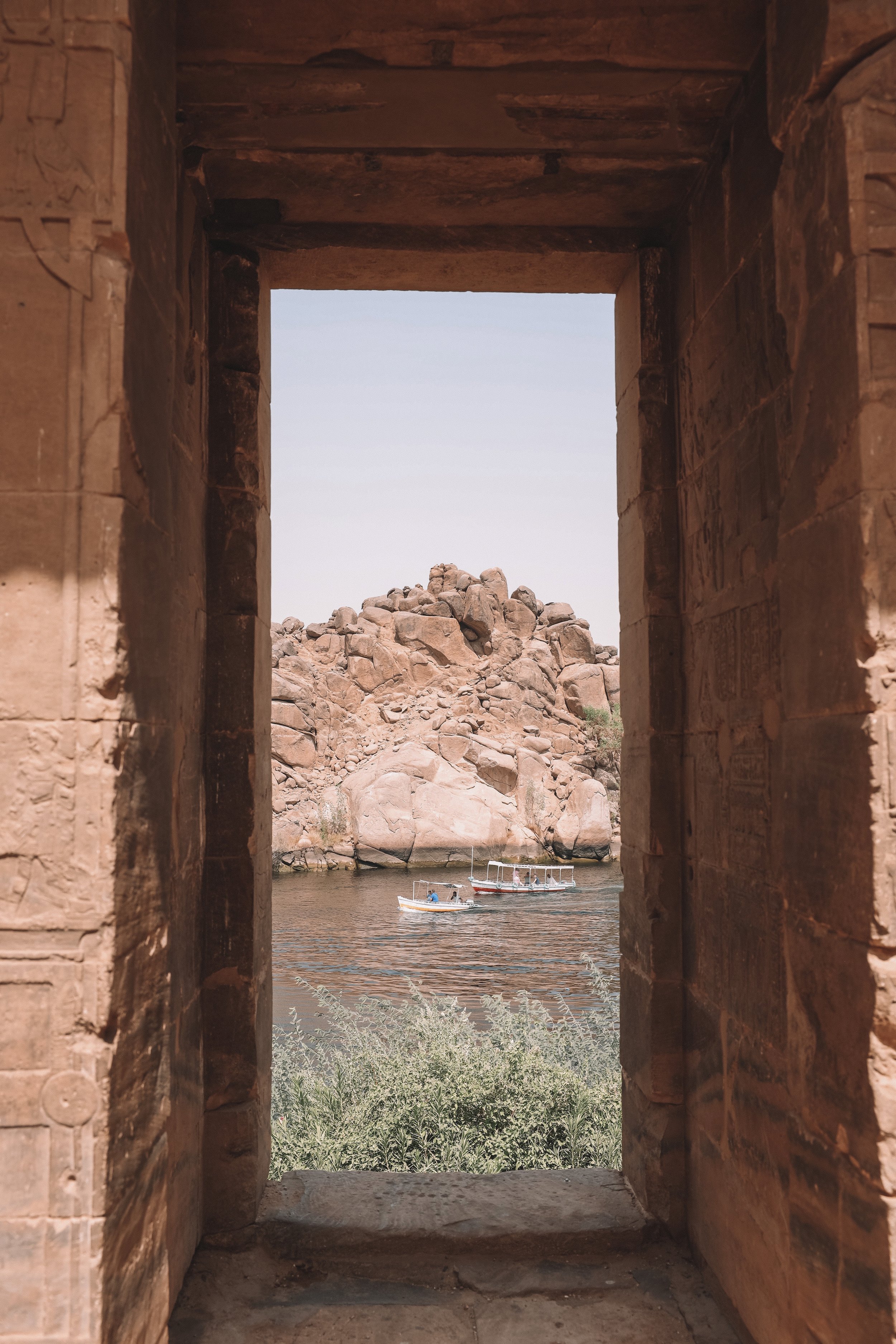 View on the Nile River through a window - Philae Temple - Aswan - Egypt